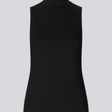 Nice top without sleeves and with a high neck. Theo top is in a nice cotton/modal quality and a basic must-have style in your wardrobe.  The model is 177 cm and wears a size S/36.