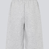 Tiamd long shorts are designed with an elasticated waistband and a longer, loose fit for a modern and comfortable feel. Perfect for casual everyday outfits or as part of a cool matching sweat set.