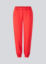 Sweatpants in bright red with logo in a cotton mixture. TiaMD pants have sidepockets, tieband, and an elastic in the bottom and waist.&nbsp;