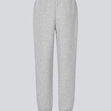 Sweatpants in grey with logo in a cotton mixture. TiaMD pants have sidepockets, tieband and an elastic in the bottom and waist.