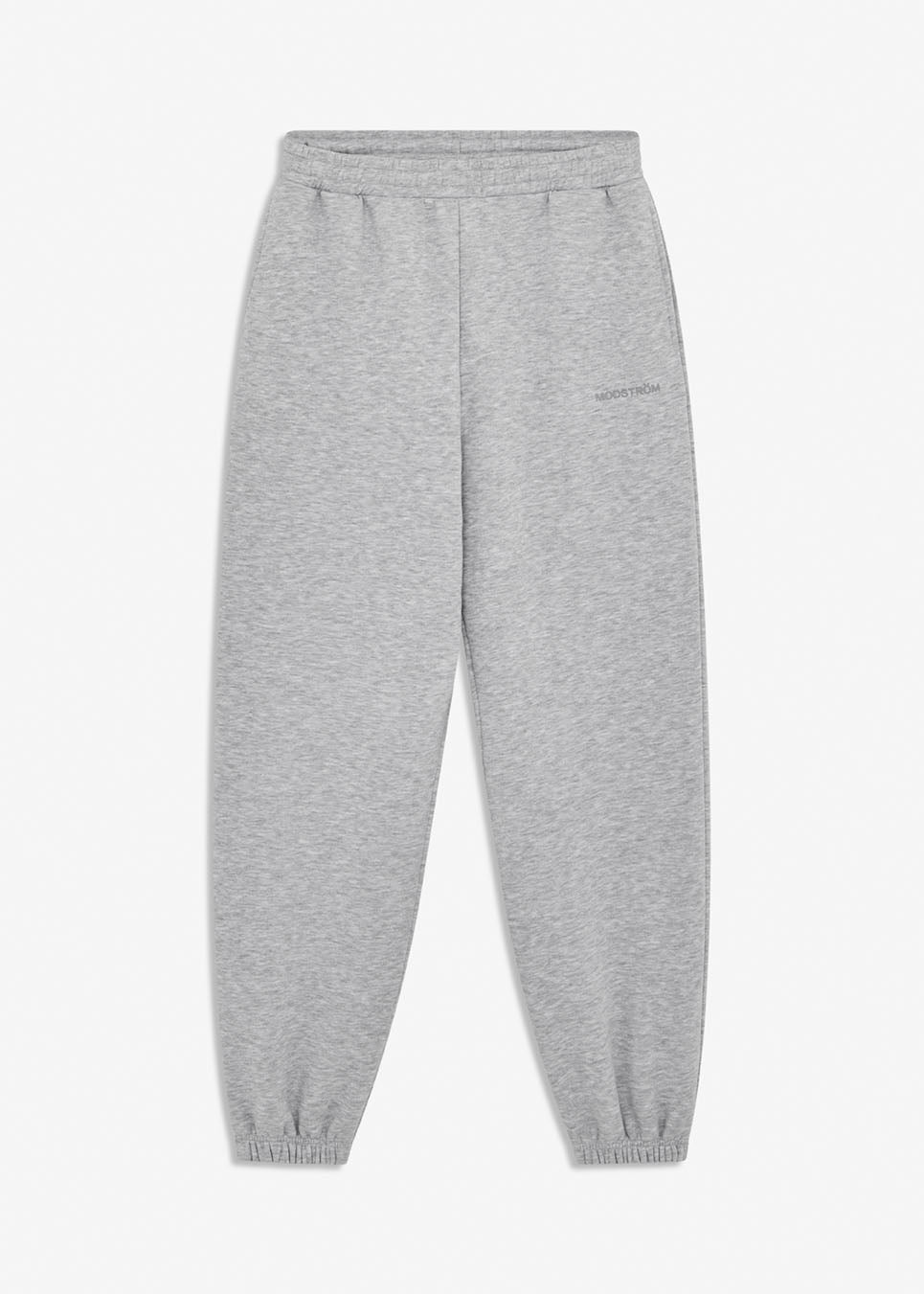 Sweatpants in grey with logo in a cotton mixture. TiaMD pants have side pockets, tieband and elastic in the bottom and waist. The model is 175 cm and wears a size S/36.