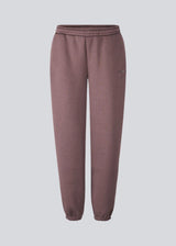 Sweatpants in brown with logo in a cotton mixture. TiaMD pants have side pockets, tieband and elastic in the bottom and waist.