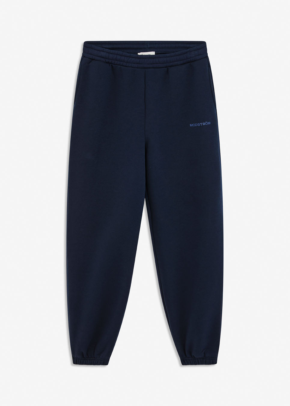 Sweatpants in navy blue with logo in a cotton mixture. TiaMD pants have side pockets, a tieband and an elastic in the bottom and waist. The model is 175 cm and wears a size S/36.