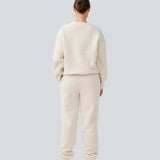 Sweatpants with logo in a cotton mixture. TiaMD pants has sidepockets, tieband and an elastic in the bottom and waist. 