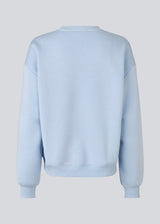 The sweatshirt is light blue/baby blue with a logo made of a cotton mixture. TiaMD sweat has a round neckline and ribbing at the sleeves and bottom.&nbsp;