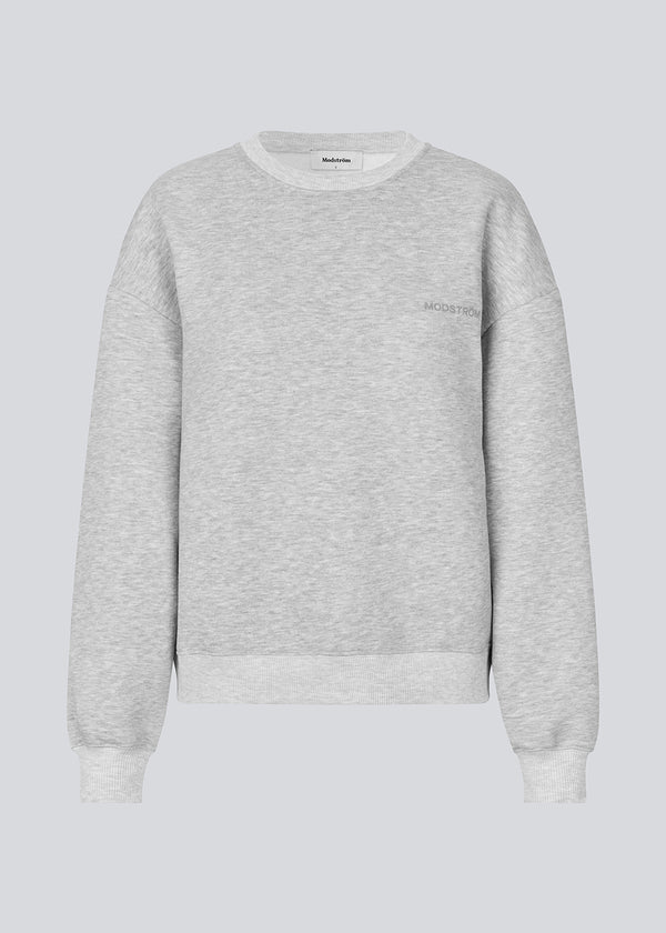 Sweatshirt in grey with logo made in a cotton mixture. TiaMD sweat has a round neckline and ribbing at the sleeves and bottom.