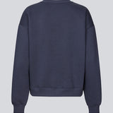 <p>Sweatshirt in navy blue with logo made in a cotton mixture. TiaMD sweat has a round neckline and ribbing at the sleeves and bottom.</p> <p>Style with matching sweatpants here.</p>