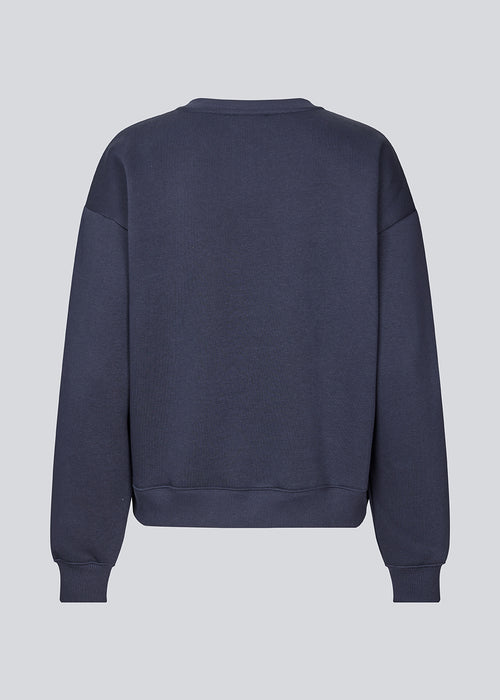 <p>Sweatshirt in navy blue with logo made in a cotton mixture. TiaMD sweat has a round neckline and ribbing at the sleeves and bottom.</p> <p>Style with matching sweatpants here.</p>