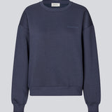<p>Sweatshirt in navy blue with logo made in a cotton mixture. TiaMD sweat has a round neckline and ribbing at the sleeves and bottom.</p> <p>Style with matching sweatpants here.</p>
