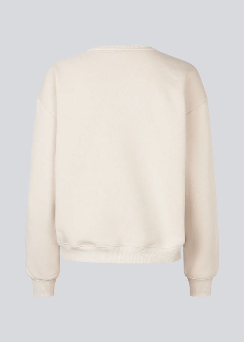 Sweatshirt with logo made in a cotton mixture. TiaMD sweat has a round neckline and ribbing at the sleeves and bottom. 