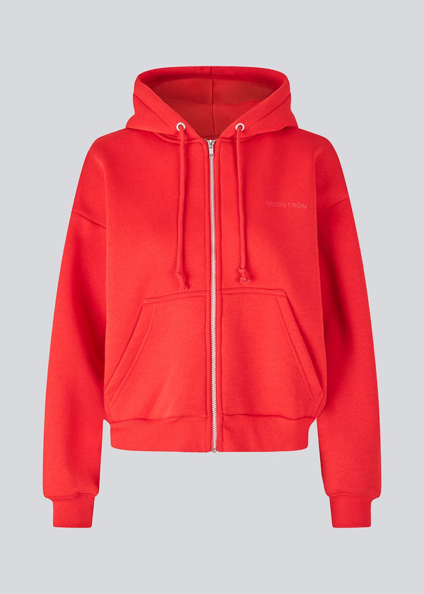 Sweatshirt in bright red with a zipper and logo in a cotton mixture. TiaMD Zip has pockets, ribbing at the sleeves and bottom and a hood with strings.&nbsp;