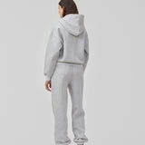 Sweatshirt in grey with a zipper and logo in a cotton mixture. TiaMD Zip has pockets, ribbing at the sleeves and bottom and a hood with strings.