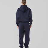 <p>Sweatshirt in navy blue with a zipper and logo in a cotton mixture. TiaMD Zip has pockets, ribbing at the sleeves and bottom, and a hood with strings.</p> <p><a href="https://modstrom.com/products/tiamd-pants-navy-sky" title="tiamd-pants-navy-sky">Style with matching pants.</a></p>