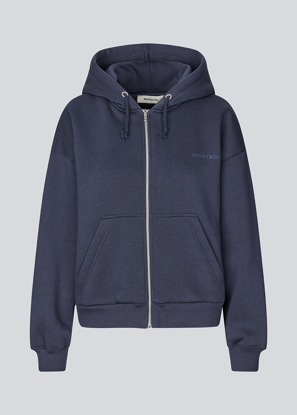 <p>Sweatshirt in navy blue with a zipper and logo in a cotton mixture. TiaMD Zip has pockets, ribbing at the sleeves and bottom, and a hood with strings.</p> <p><a href="https://modstrom.com/products/tiamd-pants-navy-sky" title="tiamd-pants-navy-sky">Style with matching pants.</a></p>