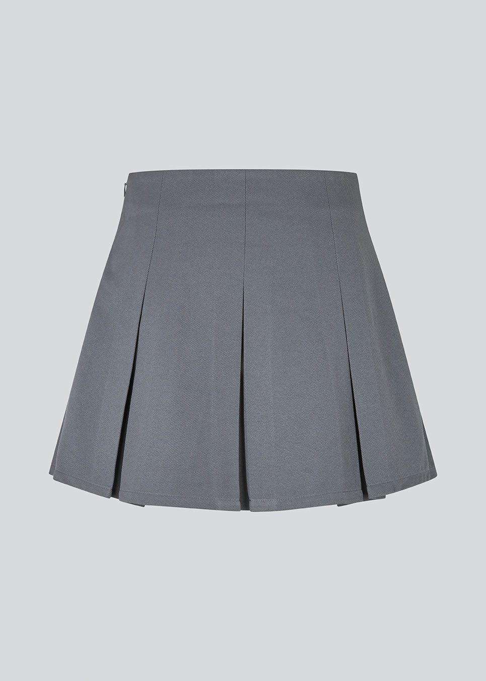 Short skirt in grey with box pleats in a structured material. TianaMD skirt has a hidden zipper on the side.