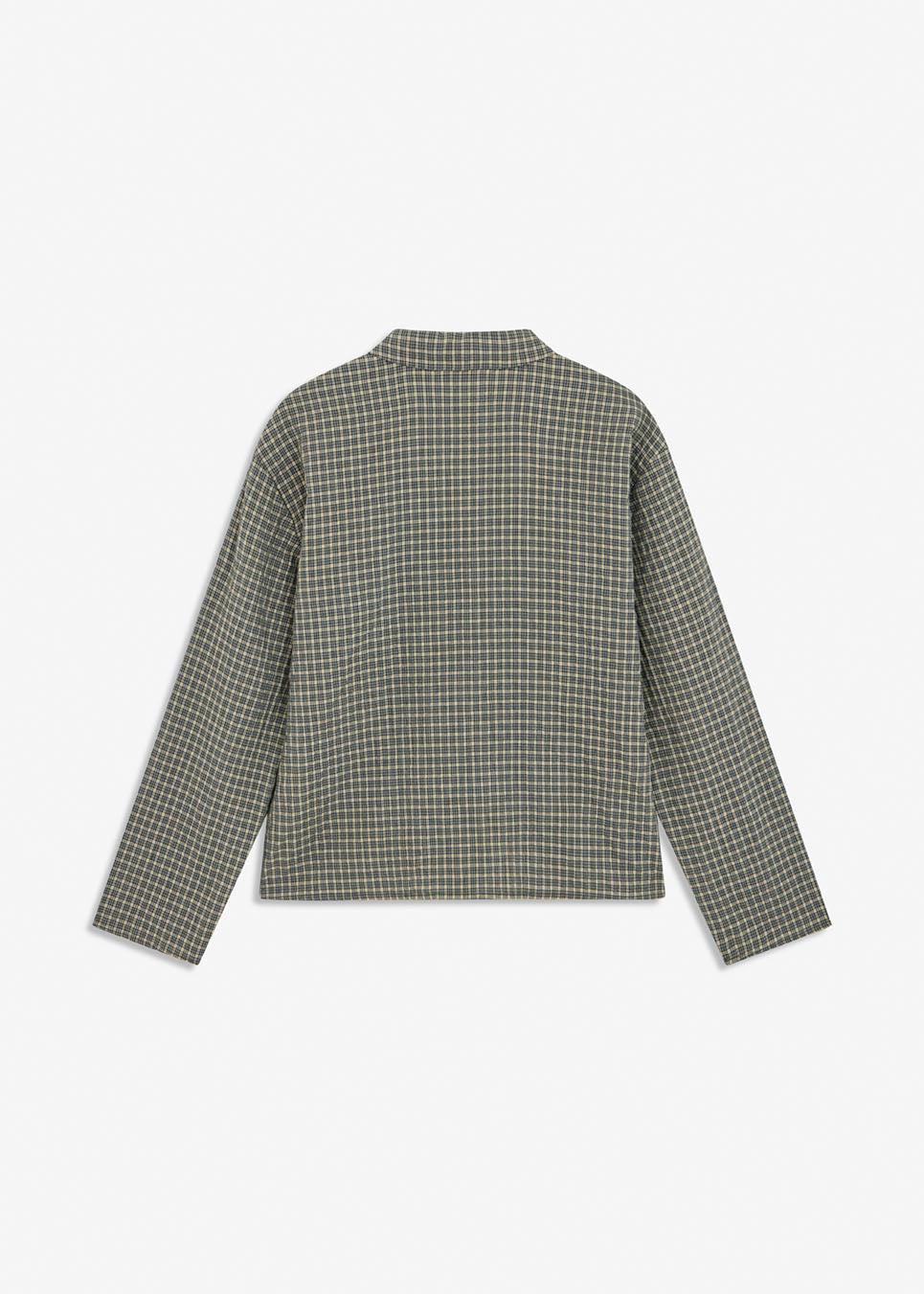 TikkaMD Shirt is a short shirt with a relaxed fit and classic checked pattern. The design features a shirt collar, concealed button fastening and a chest pocket. Style it with jeans or our matching Tikkamd Skirt.