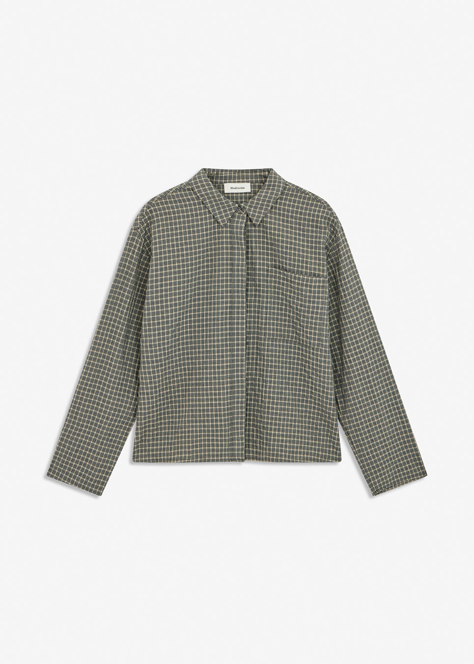 TikkaMD Shirt is a short shirt with a relaxed fit and classic checked pattern. The design features a shirt collar, concealed button fastening and a chest pocket. Style it with jeans or our matching Tikkamd Skirt.