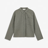 TikkaMD Shirt is a short shirt with a relaxed fit and classic checked pattern. The design features a shirt collar, concealed button fastening and a chest pocket. Style it with jeans or our matching Tikkamd Skirt.