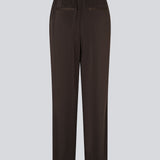 Brown loose satin pants. Timmiemd pants has wide legs, sidepockets, and a tiefastening. A relaxed fit with an elegant look.