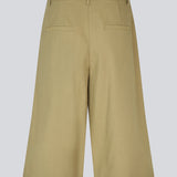 Long tailored shorts with pressed pleats. The ToreMD Long Shorts feature belt loops and a concealed zipper closure. A cool and casual choice that combines classic details with a modern, relaxed look.