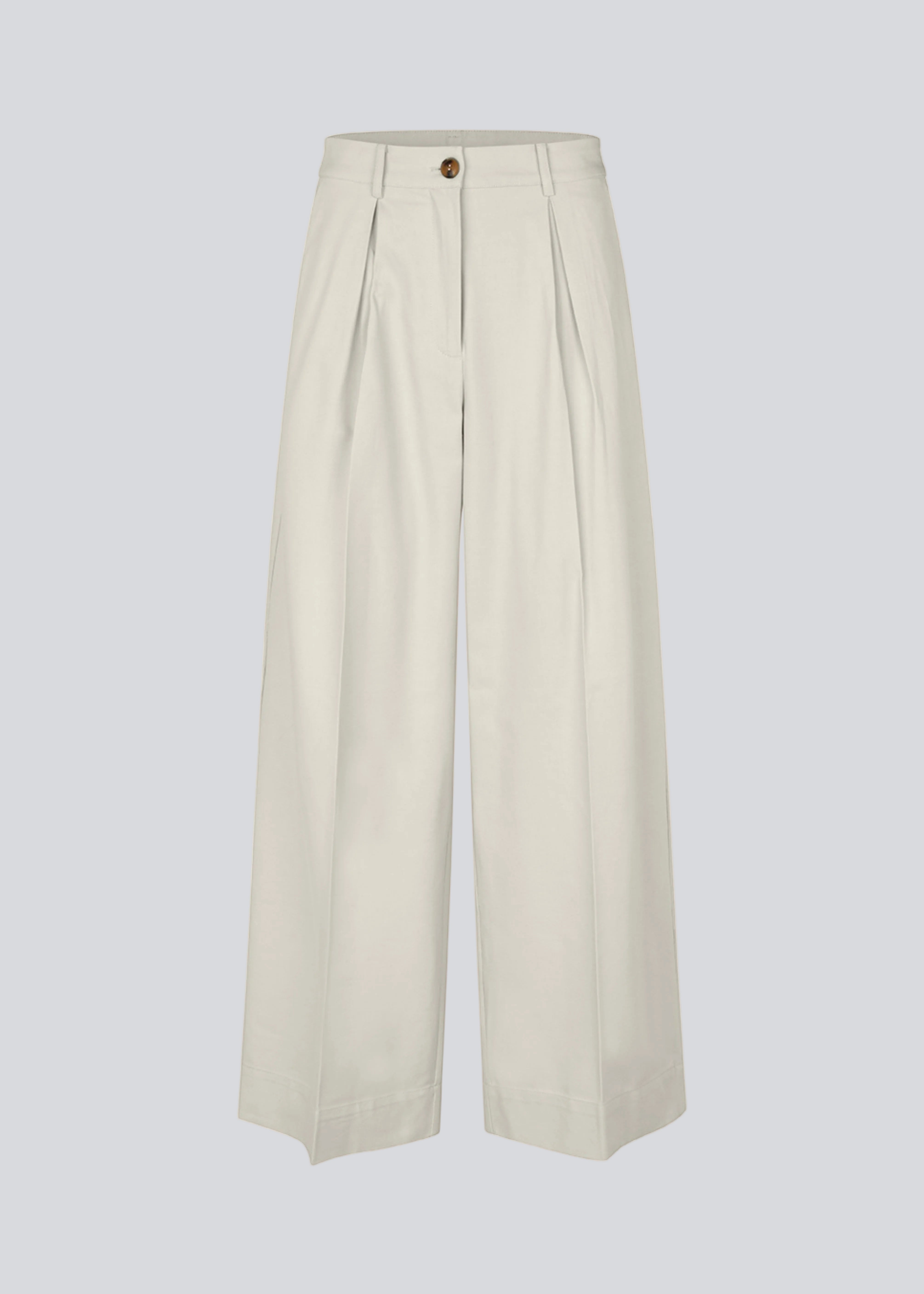 Suit pants in Twill with wide legs and pleats at the top. ToreMD pants has a medium-high waist, zipper, side pockets and paspoil pocket in the back.