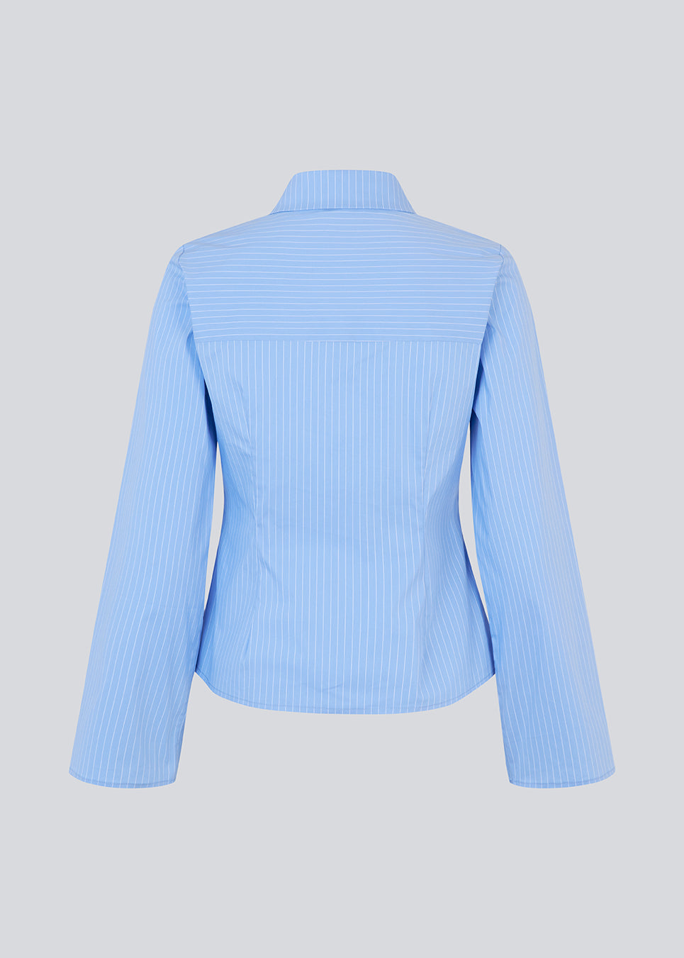 Classic fitted shirt in a cottonmix. ToveMD stripe shirt has a collar, button closure in front and long wide sleeves.