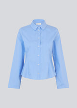 Classic fitted shirt in a cottonmix. ToveMD stripe shirt has a collar, button closure in front and long wide sleeves.