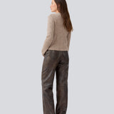 Fitted beige cardigan in a soft knit. TreeMD cardigan has a high neck and a zipper closure in front.
