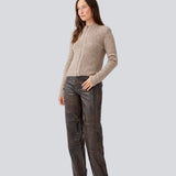 Fitted beige cardigan in a soft knit. TreeMD cardigan has a high neck and a zipper closure in front.