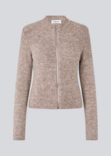 Fitted beige cardigan in a soft knit. TreeMD cardigan has a high neck and a zipper closure in front.