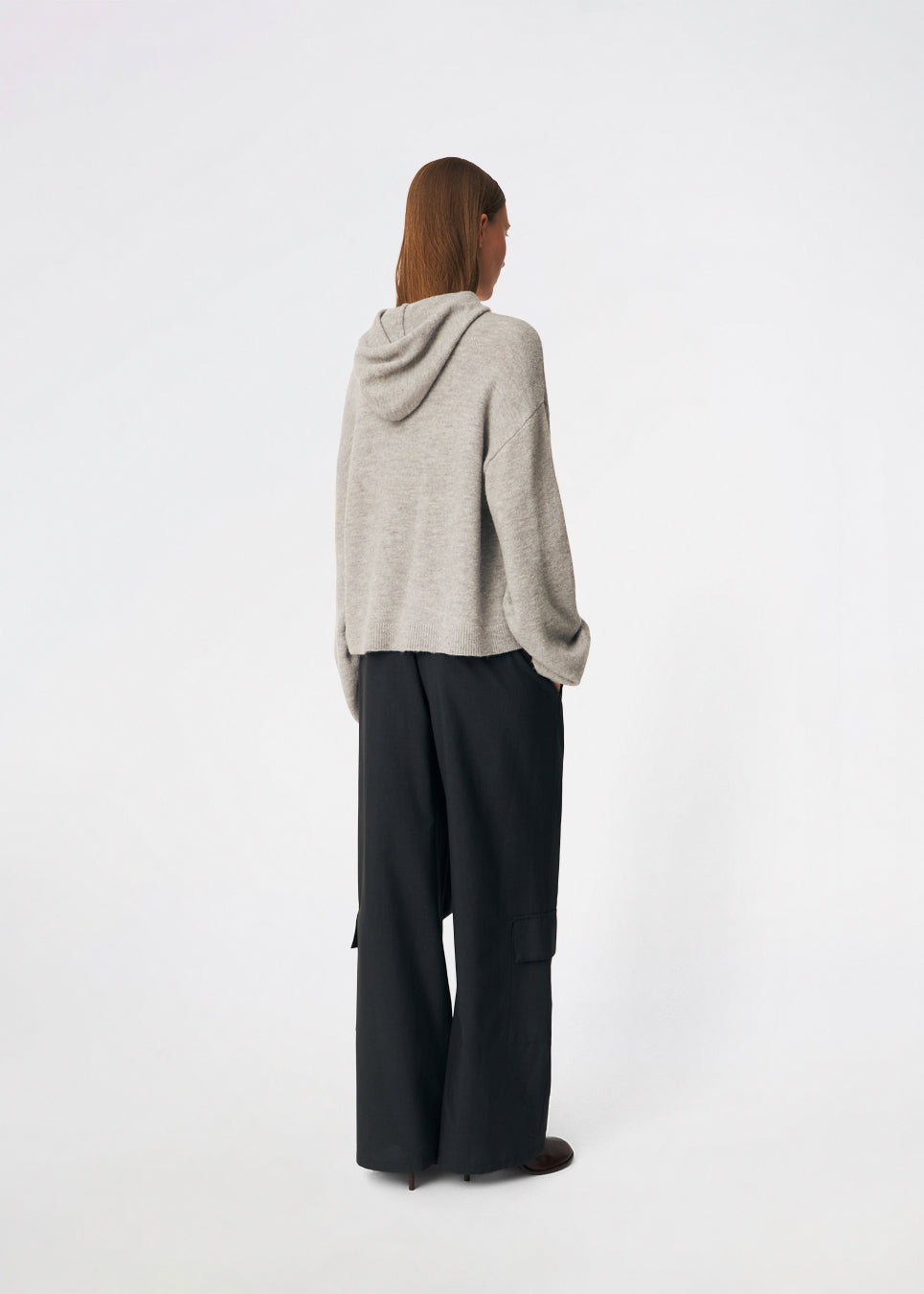 The Treemd Hoodie is a soft knitted hoodie with a relaxed fit and a clean, minimalist look. Its lightweight knit and roomy hood make it an easy everyday layering piece, while the ribbed trims add a refined finish. Style it with denim, tailored trousers or matching knitwear for an effortless everyday outfit.