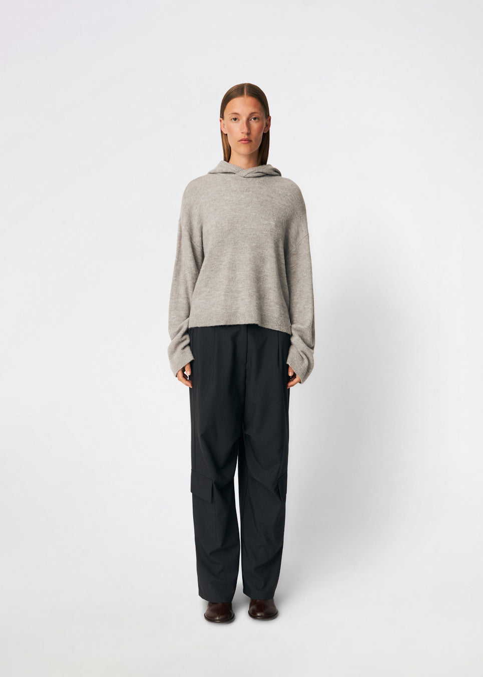 The Treemd Hoodie is a soft knitted hoodie with a relaxed fit and a clean, minimalist look. Its lightweight knit and roomy hood make it an easy everyday layering piece, while the ribbed trims add a refined finish. Style it with denim, tailored trousers or matching knitwear for an effortless everyday outfit.