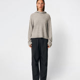 The Treemd Hoodie is a soft knitted hoodie with a relaxed fit and a clean, minimalist look. Its lightweight knit and roomy hood make it an easy everyday layering piece, while the ribbed trims add a refined finish. Style it with denim, tailored trousers or matching knitwear for an effortless everyday outfit.
