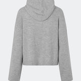 The Treemd Hoodie is a soft knitted hoodie with a relaxed fit and a clean, minimalist look. Its lightweight knit and roomy hood make it an easy everyday layering piece, while the ribbed trims add a refined finish. Style it with denim, tailored trousers or matching knitwear for an effortless everyday outfit.