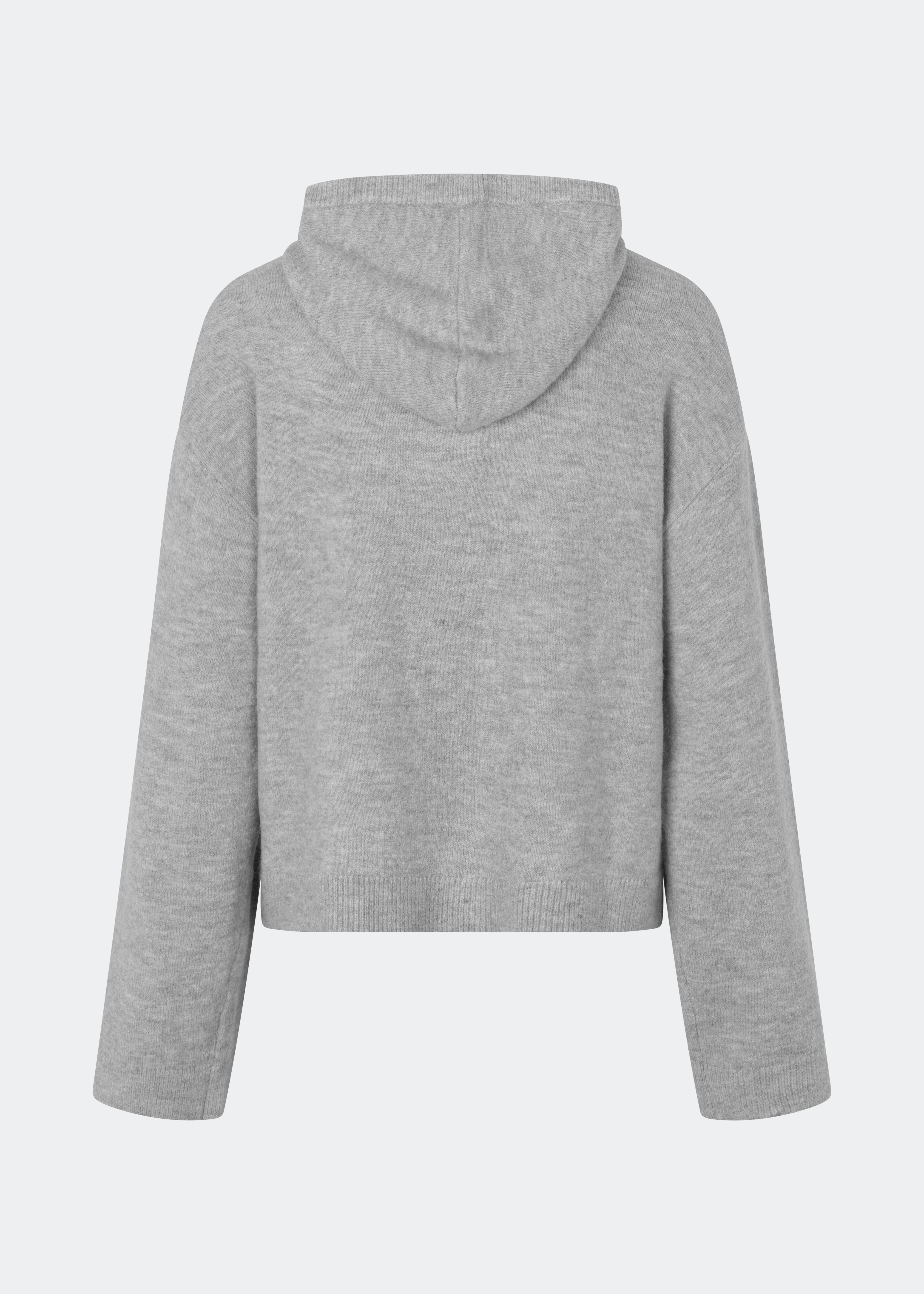 The Treemd Hoodie is a soft knitted hoodie with a relaxed fit and a clean, minimalist look. Its lightweight knit and roomy hood make it an easy everyday layering piece, while the ribbed trims add a refined finish. Style it with denim, tailored trousers or matching knitwear for an effortless everyday outfit.