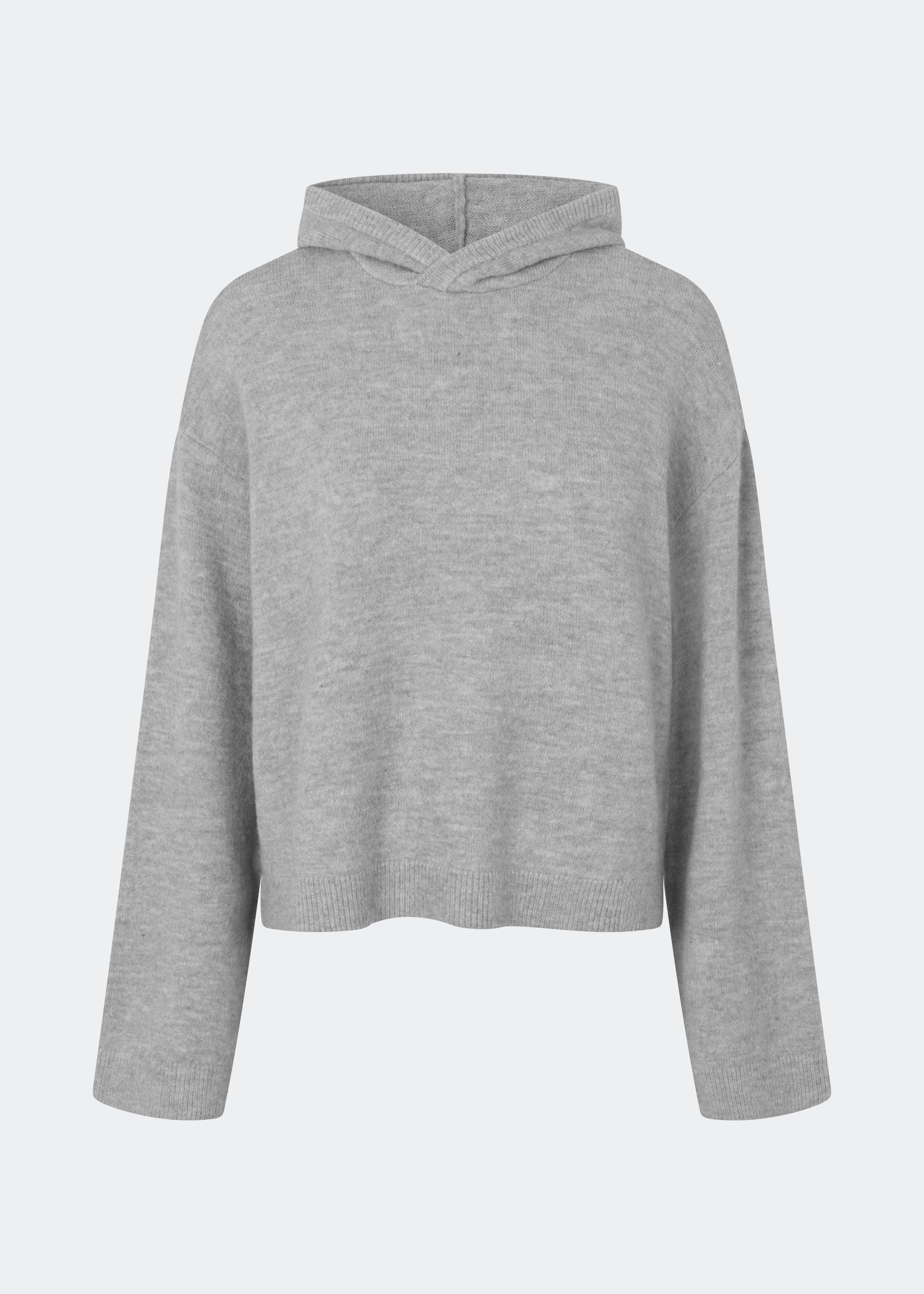 The Treemd Hoodie is a soft knitted hoodie with a relaxed fit and a clean, minimalist look. Its lightweight knit and roomy hood make it an easy everyday layering piece, while the ribbed trims add a refined finish. Style it with denim, tailored trousers or matching knitwear for an effortless everyday outfit.