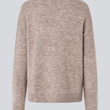 Loose knit in beige melange in plain jersey knit. TreeMD o-neck has a round neckline and long loose sleeves.
