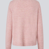Loose knit in a light rose color in plain jersey. TreeMD o-neck has a round neckline and long loose sleeves.