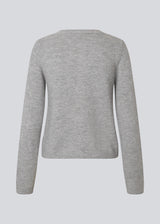 Light grey fitted cardigan in soft knit. The TreeMD cardigan features a round neckline and delicate buttons in a matching color, highlighting its simple and feminine expression.