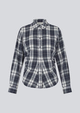 Fitted shirt in flannel. TappoMD shirt has a button closure in front and a manchet with button closure.&nbsp;