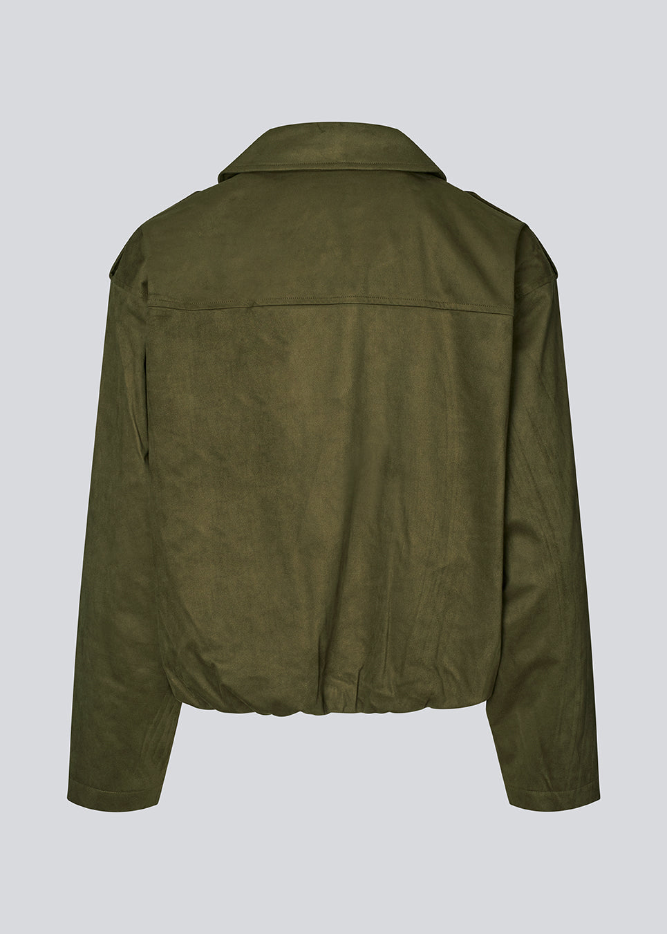 Short green jacket made from a soft, suede-like material. Features a classic shirt collar, hidden zip and button closure at the front, and practical front pockets. The structured shoulders with strap details and the slightly elasticated hem add a modern, tailored touch. A versatile and stylish piece, perfect for transitional weather and everyday wear.