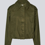 Short green jacket made from a soft, suede-like material. Features a classic shirt collar, hidden zip and button closure at the front, and practical front pockets. The structured shoulders with strap details and the slightly elasticated hem add a modern, tailored touch. A versatile and stylish piece, perfect for transitional weather and everyday wear.