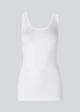 Nice and classic white basic top with wide straps and in a tight fit. Tulla is a must-have for any wardrobe and a Modström bestseller every season.