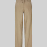 Long pants in the color Dune with a relaxed fit and long wide legs and elasticated waist for extra comfort. TulsiMD pants are made from a soft mix of linen and rayon. The model is 177 cm and wears a size S/36.
