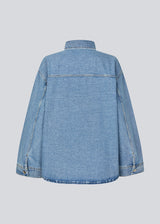 Oversize denim jacket with button closure in front and long wide sleeves. TylinMD jacket has two pockets at the chest and a shirt collar.
