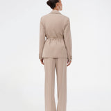 Comfortable suit trousers in beige with an elasticated waistband at the back. The UcheMD Pants feature a concealed zip fastening, pressed creases, and combine relaxed comfort with an elegant finish. Made from 63% recycled polyester. The model is 175 cm and wears a size S/36.

Style the pants with matching vest and blazer

Material:
4% Elastane
63% Recycled Polyester
33% Rayon

Lining:
100% Polyester
