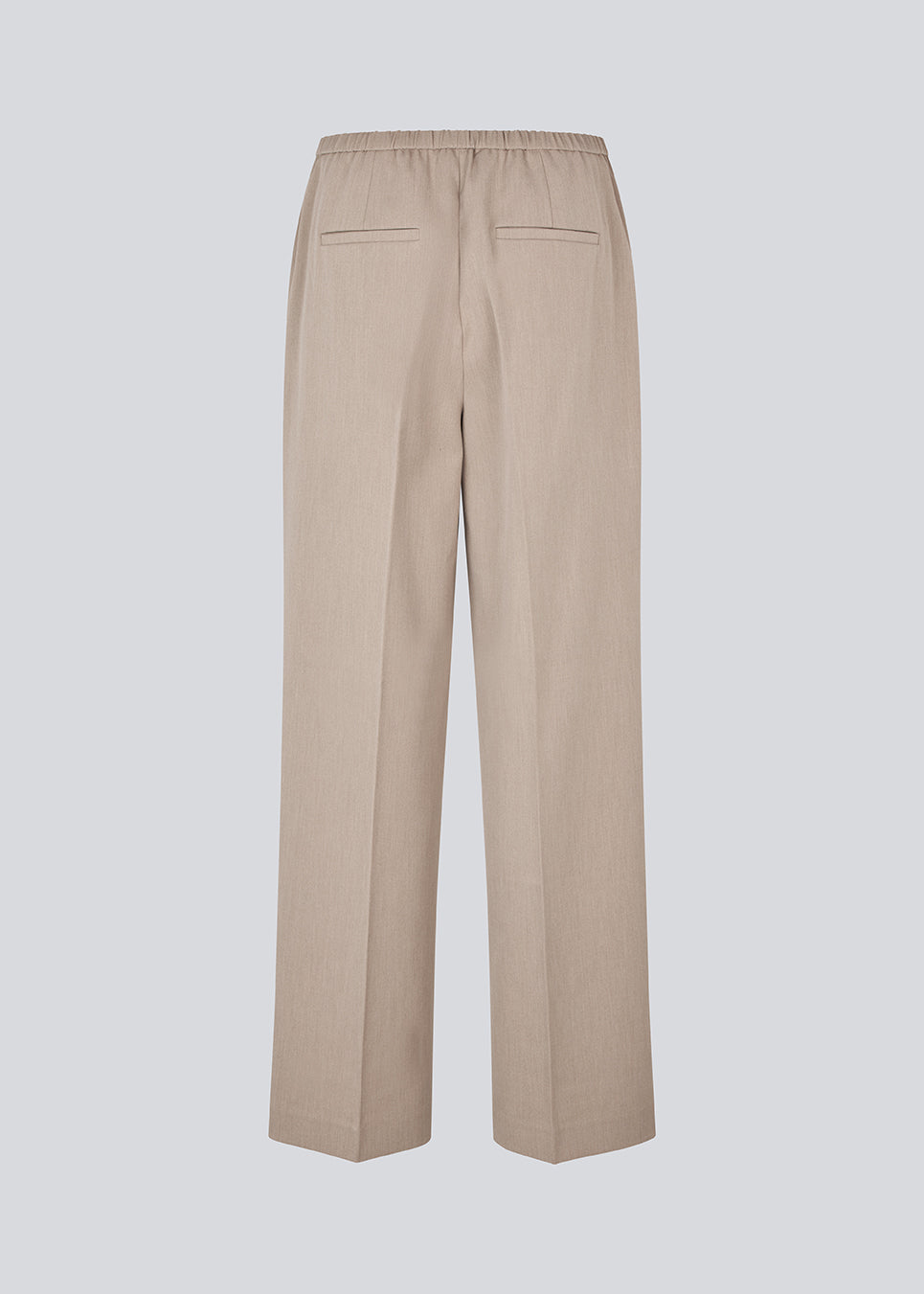 Comfortable suit trousers in beige with an elasticated waistband at the back. The UcheMD Pants feature a concealed zip fastening, pressed creases, and combine relaxed comfort with an elegant finish. Made from 63% recycled polyester. The model is 175 cm and wears a size S/36.

Style the pants with matching vest and blazer

Material:
4% Elastane
63% Recycled Polyester
33% Rayon

Lining:
100% Polyester
