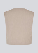 Minimalist vest in beige with clean lines. The UcheMD vest is sleeveless with a round neckline and a concealed closure – perfect for layering or worn on its own. Made from 63% recycled polyester.

Style the vestwith matching pants: Uchemd pants

Material:
4% Elastane
63% Recycled Polyester
33% Rayon

Lining:
100% Polyester