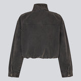 High-neck denim jacket with zipper in black. The UdolineMD Jacket features a cool washed denim look with long sleeves, practical side pockets, and an elasticated waist that creates a modern and relaxed expression