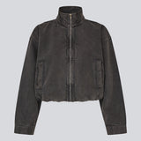 High-neck denim jacket with zipper in black. The UdolineMD Jacket features a cool washed denim look with long sleeves, practical side pockets, and an elasticated waist that creates a modern and relaxed expression